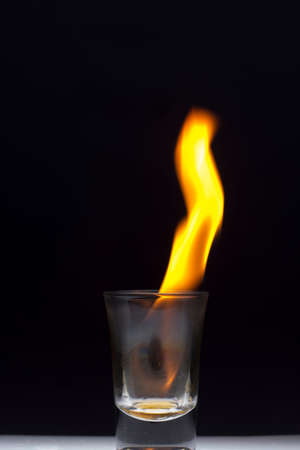 Tequila on fire backgroundの写真素材