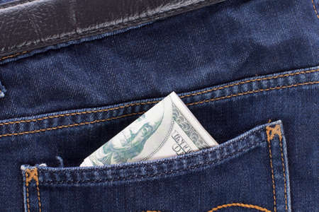 dollars in the back jeans pocketの写真素材