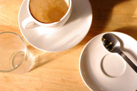 Empty cup of coffee when work doneの写真素材
