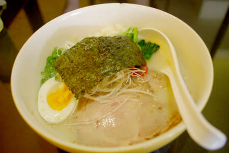 japanese noodle ramen, pork barbecue, boiled egg and seaweedの写真素材