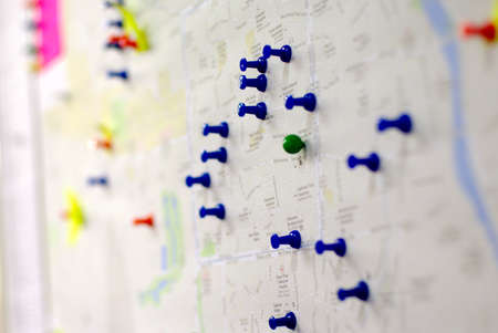coloful pins on the mapの写真素材