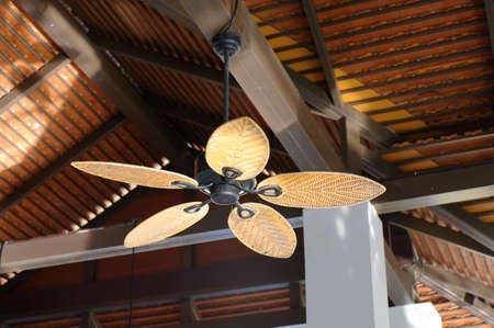 tropical wooden colonial style ceiling fanの写真素材