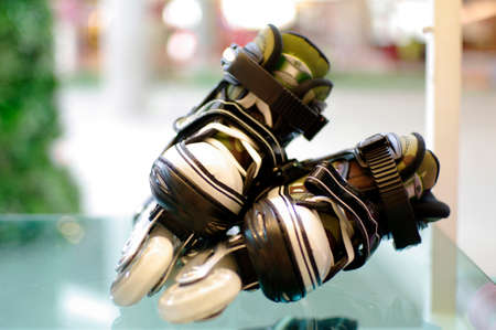 black and white roller blade shoes