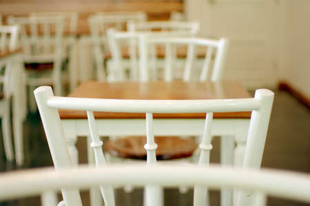 white and wood table chair cafeの写真素材