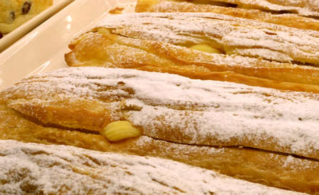  Frosted eclair in pastry shop