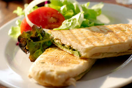 panini chicken pesto with saladの写真素材