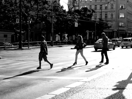 abstract black and white color photo of people walking