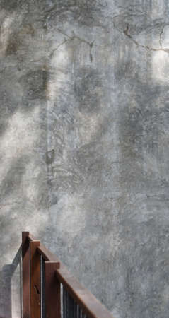 wood railing and colum with polished concrete textureの写真素材