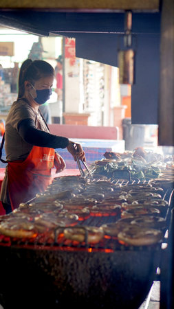 sausage bbq vendor in Thailand local marketのeditorial素材