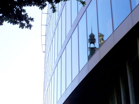 church reflection on mirror, reflective exterior of modern architectの写真素材