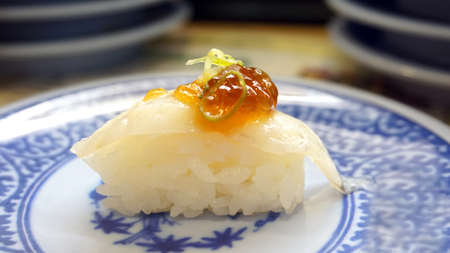 sushi nigiri white fish, seabass with salmon roeの写真素材