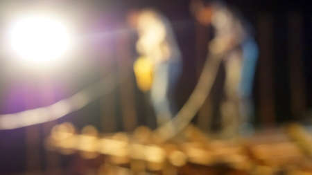 blur picture of construction site at night workersの写真素材