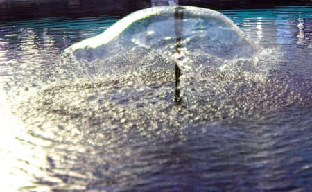Beautiful water fountain, sphere dancing water half roundの写真素材