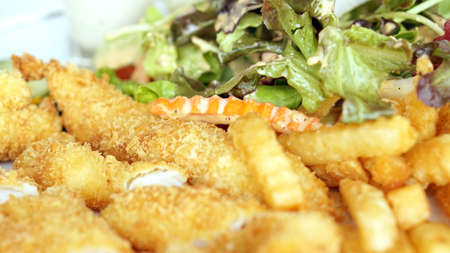 fish fingers with salad, healthy mealの写真素材