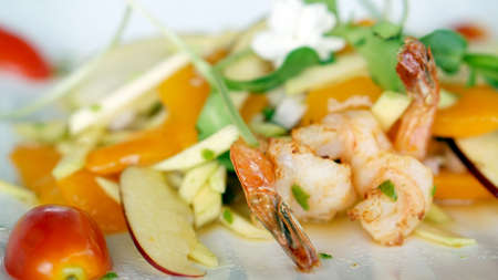 seafood and fruits salad appitizer decorate with jasmin flowerの写真素材