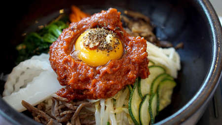 bibimbap, Korean hot mix side dishes food with red sauceの写真素材