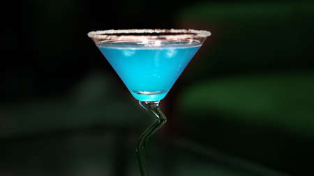 blue cocktail on dark isolated backgroundの写真素材