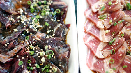 raw beef slice for barbecue or Japanese style yakinikuの写真素材