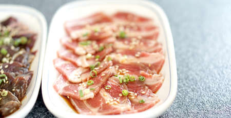 raw beef slice for barbecue or Japanese style yakinikuの写真素材
