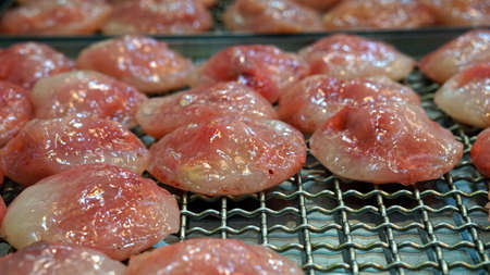 Chinese pink dumpling with chives or prok insideの写真素材