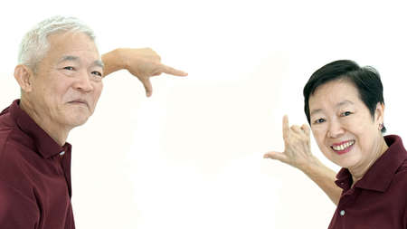 Asian senior couple frame up copy space white isolate backgroundの写真素材