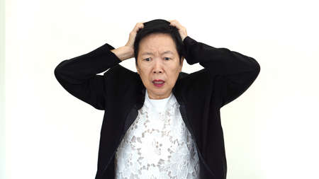 Asian senior businesswoman stressed outの写真素材