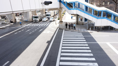 Business concept street view of Japanese businessman crossing the traffic junctionのeditorial素材