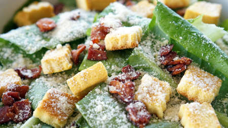 Close up shot of caesar salad, organic green vegetable with parmesan cheese and crutonsの写真素材