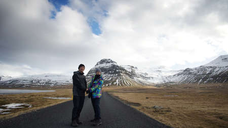 Asian senior on road trip in Europe, Iceland. Abstract enjoy love and life after retirementの写真素材
