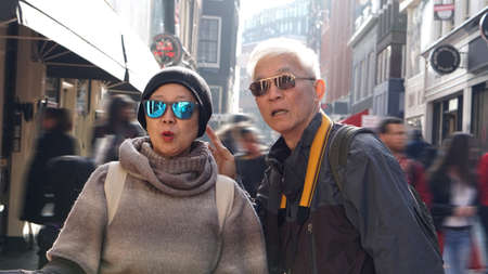 Asian senior couple lost in Europe. Travel after retirement get confuse during the tripの写真素材