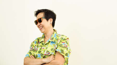 Healthy Asian senior woman looking forward for holiday tripの写真素材