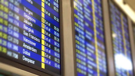 Flight time table schedule screen for international flights in airportの写真素材