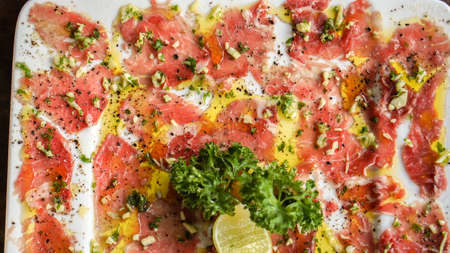 Raw slice beef carpaccio, tasty Italian cuisineの写真素材