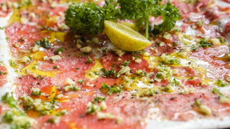 Raw slice beef carpaccio, tasty Italian cuisineの写真素材