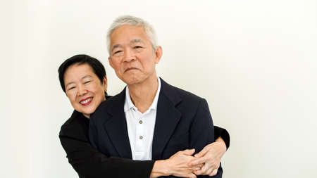 Happy Asian senior couple. Success in business and life, stay togher foreverの写真素材
