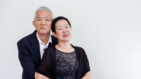 Happy Asian senior couple. Success in business and life, stay togher foreverの写真素材