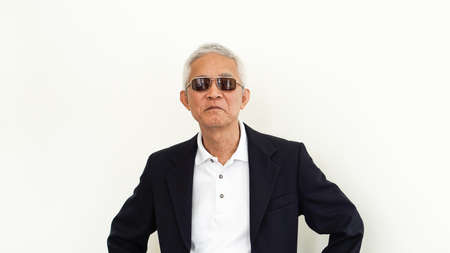 Asian senior man casual business attire suit with happy face and sunglassesの写真素材