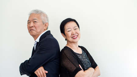 Happy Asian senior couple. Success in business and life, stay togher foreverの写真素材