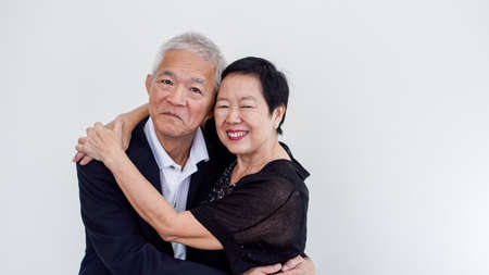 Happy Asian senior couple. Success in business and life, stay togher forever