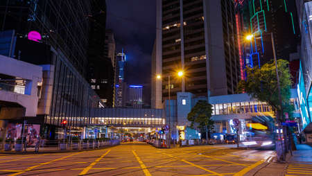 Hong Kong Central buisness district area night view from moving tram transportationの写真素材