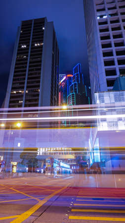 Hong Kong Central buisness district area night view from moving tram transportation