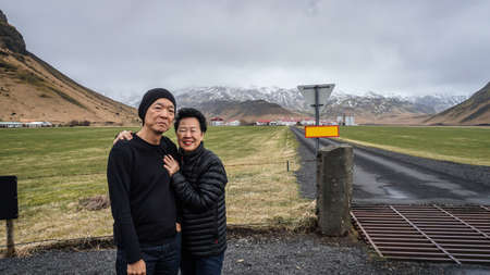 Asian senior couple travel with tour to Iceland fun tripの写真素材
