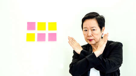 Asian business senior woman unhappy expression with copy spaceの写真素材
