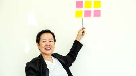 Asian senior business woman happy smiling expressionの写真素材