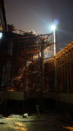Construction at night structure with light building cityの写真素材