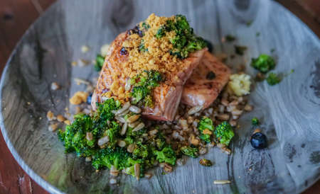Grilled salmon steak nordic style rustic seafood dishの写真素材