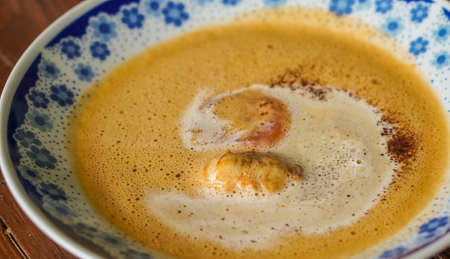 Bowl of creamy delicious lobster soupの写真素材