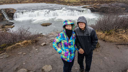 Asian senior couple travel to Iceland amazing retirement tripの写真素材