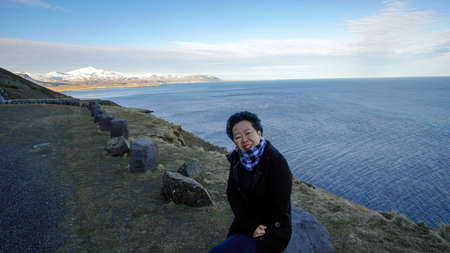 Asian senior woman travel to Europe, Iceland enjoy lifeの写真素材