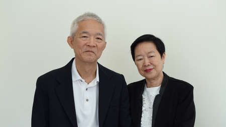 Happy smile Asian senior couple in business attire, SME family ownerの写真素材